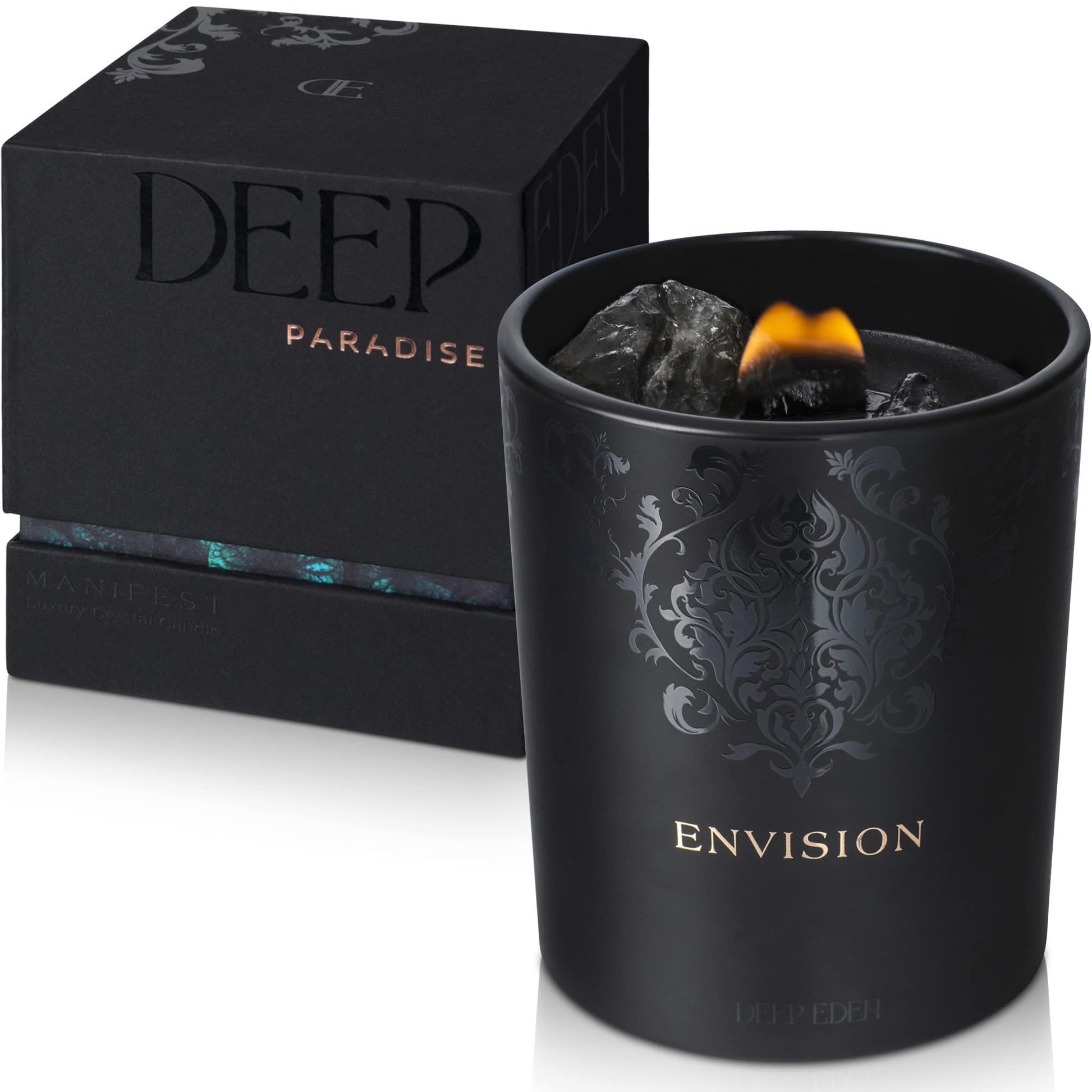 Black Envision candle with crystals inside, displayed in front of a matching Deep Eden gift box on a white background.