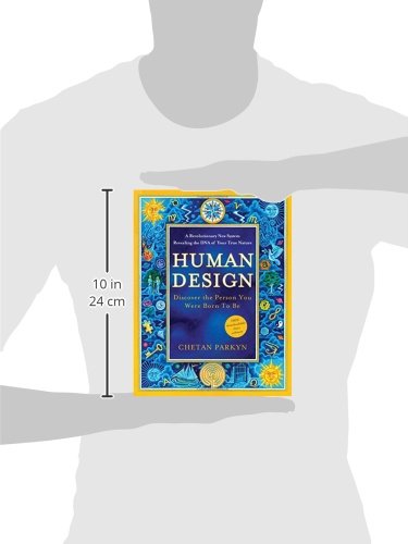 Human Design book shown in a person’s hands with measurement markers to display size on a white background.